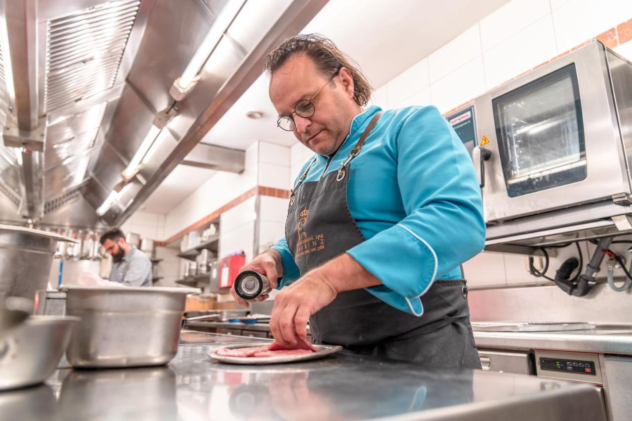 Hotel-Restaurant Erbprinz Ettlingen Exterior foto Chef preparing a dish